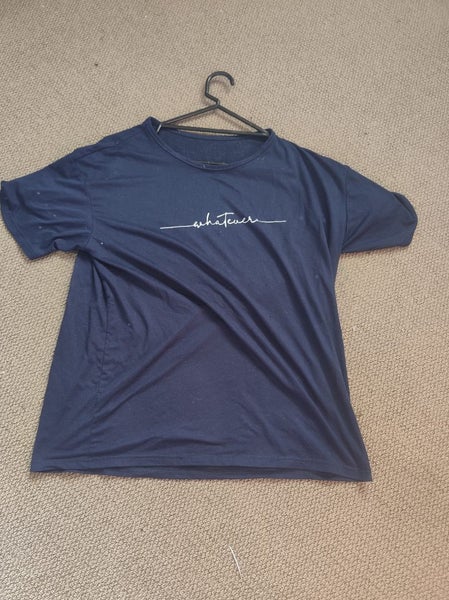 Shirt saying Whatever on it. Carousel 1