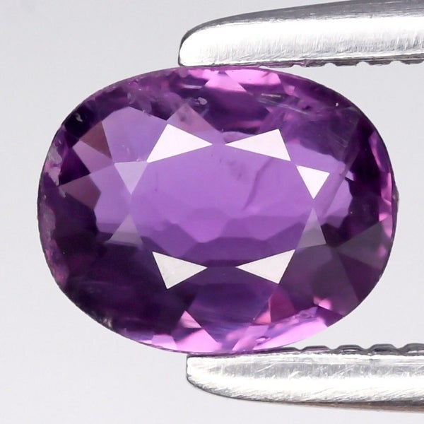 $1 RES * Buy Now $1,300.00 * 0.55ct Oval Purple SAPPHIRE Loose Gemstone Carousel 1