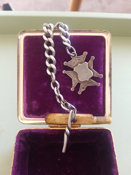 Antique silver hallmarked fob and bracelet chain.. Carousel 1