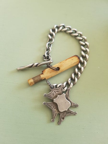 Antique silver hallmarked fob and bracelet chain.. Carousel 2