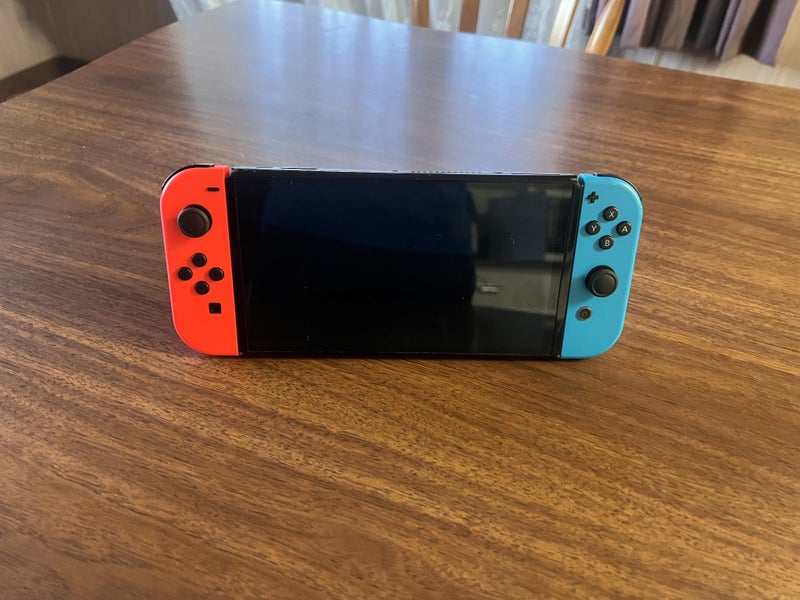 Nintendo Switch OLED Bundle + Extra Joy-Cons & Case Carousel 2