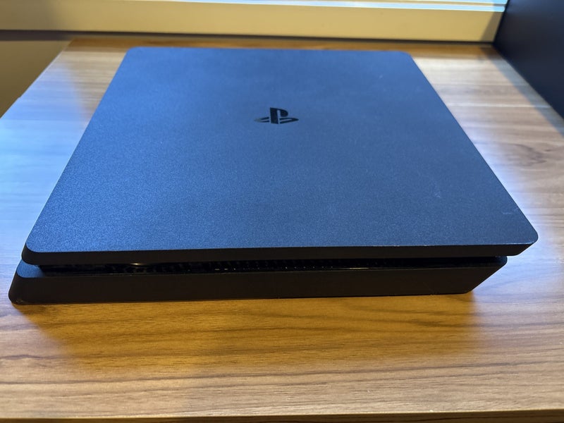PS4 slim 500 Gb with Controller Carousel 1
