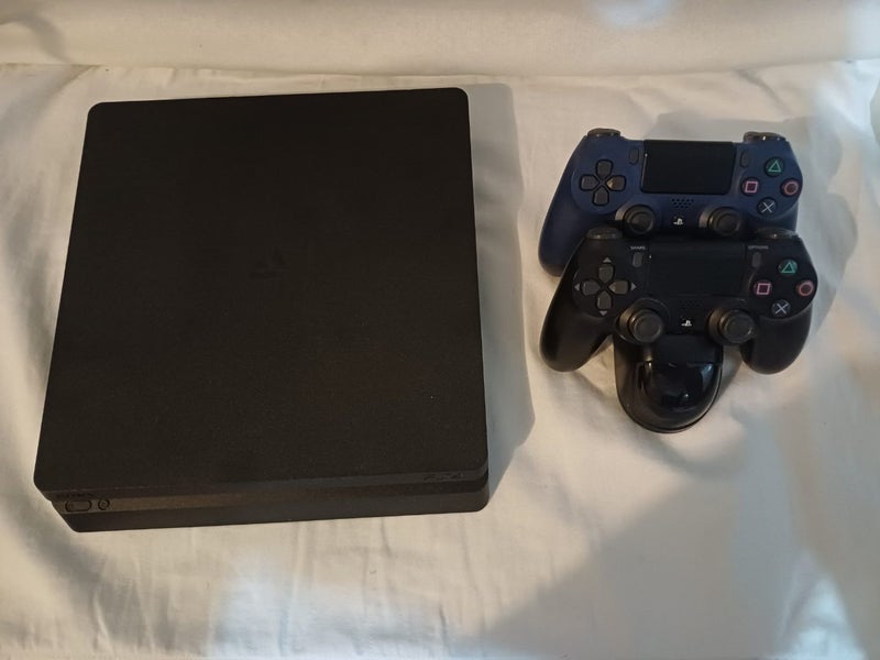 PS4 slim console with 2 controllers Carousel 1