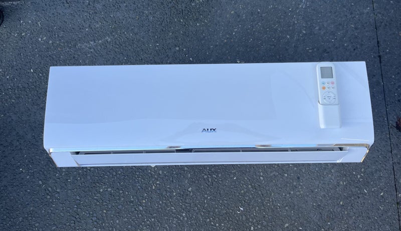 Used AUX 1.25 KW high wall and outdoor unit Carousel 1