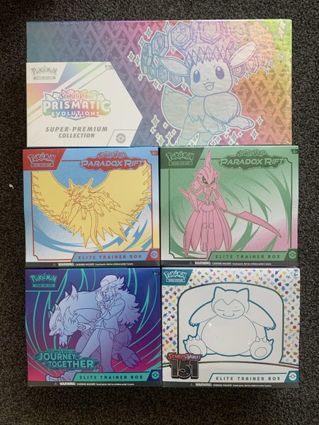 Prismatic Evolutions Super Premium Collection (SPC) ETB Bundle Carousel 1