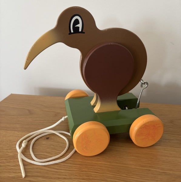 Dick Frizzell- Iconic Kiwi Wooden Pull along Toy Carousel 1