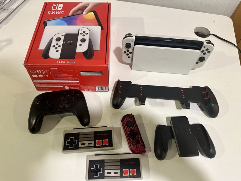 Nintendo Switch Oled model with accessories Carousel 1