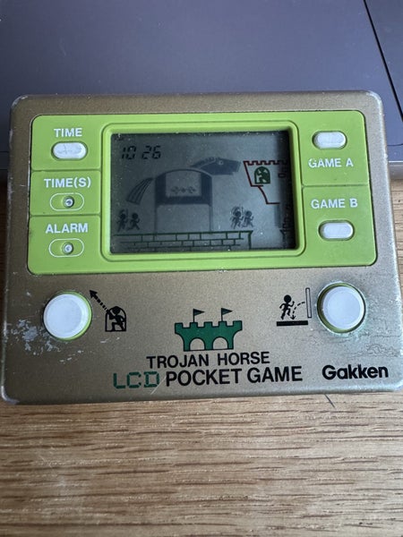 Gakken Trojan horse game and watch 1980s Carousel 1