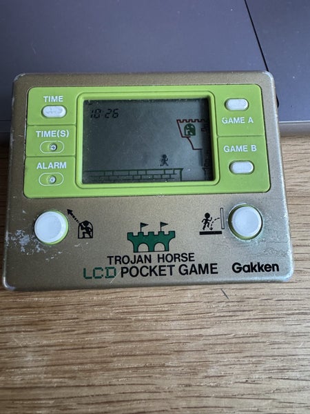 Gakken Trojan horse game and watch 1980s Carousel 2