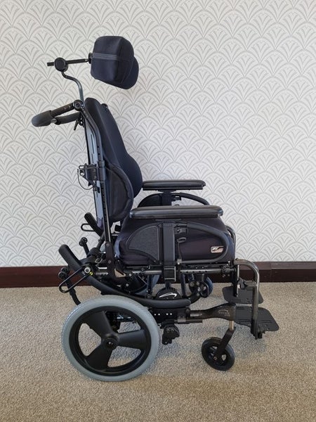 Quickie IRIS Tilt-in-space wheelchair Carousel 1