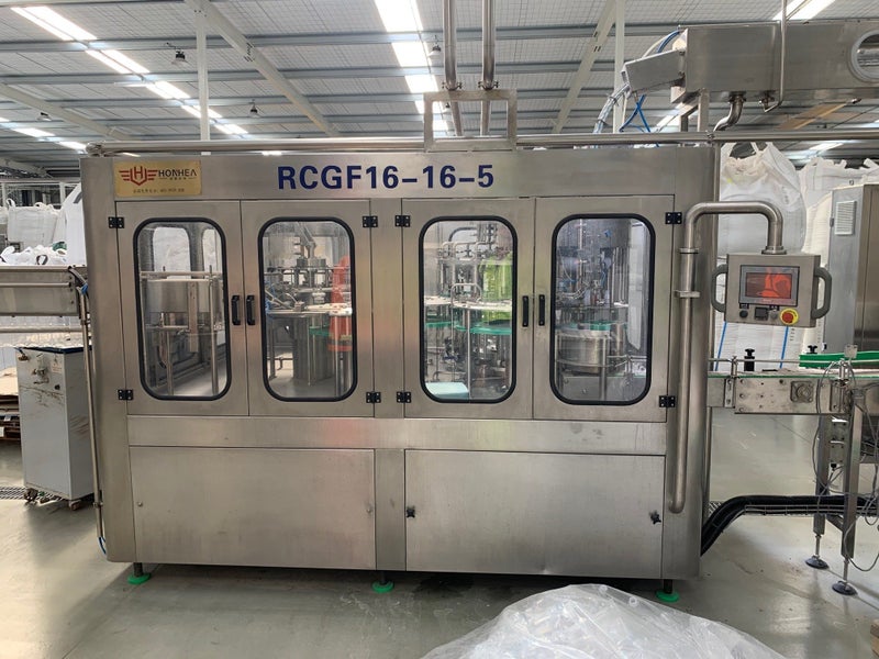 3-in-1 Washing, Filling, and Capping Machine for Glass/PET Bottles Hot / Cold Carousel 2