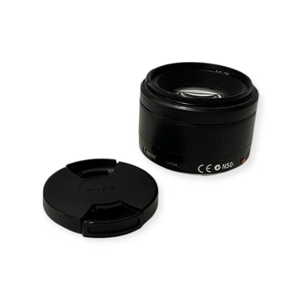 Sony Camera Lens SAL50F14 + Minolta 3xi film camera Carousel 1