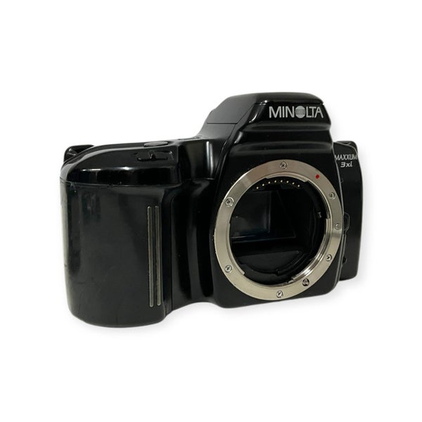 Sony Camera Lens SAL50F14 + Minolta 3xi film camera Carousel 5