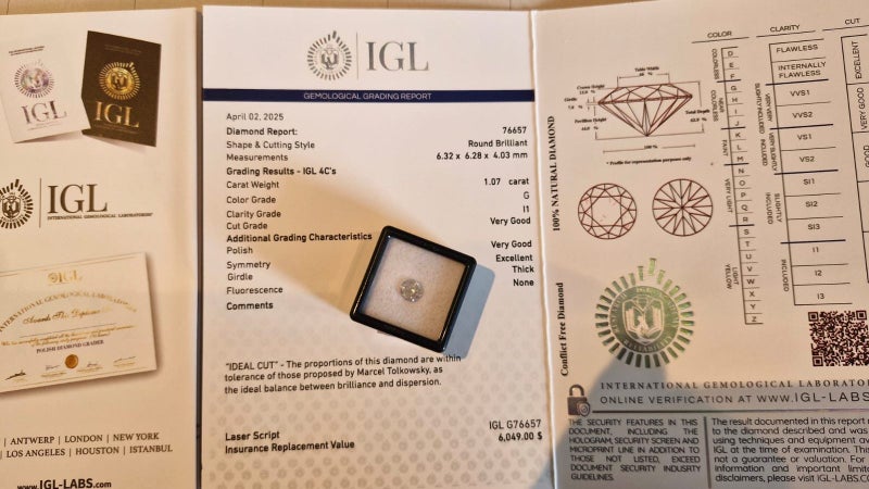 $1 RES * Valuation $10,123.00 * 1.07ct Round Large White Diamond Loose IGL CERT Carousel 1