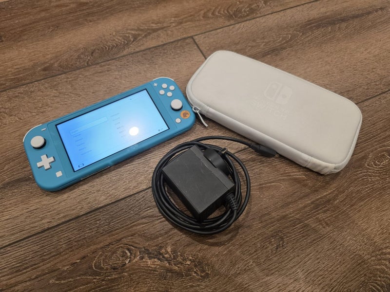 Nintendo Switch Lite with Case Carousel 1