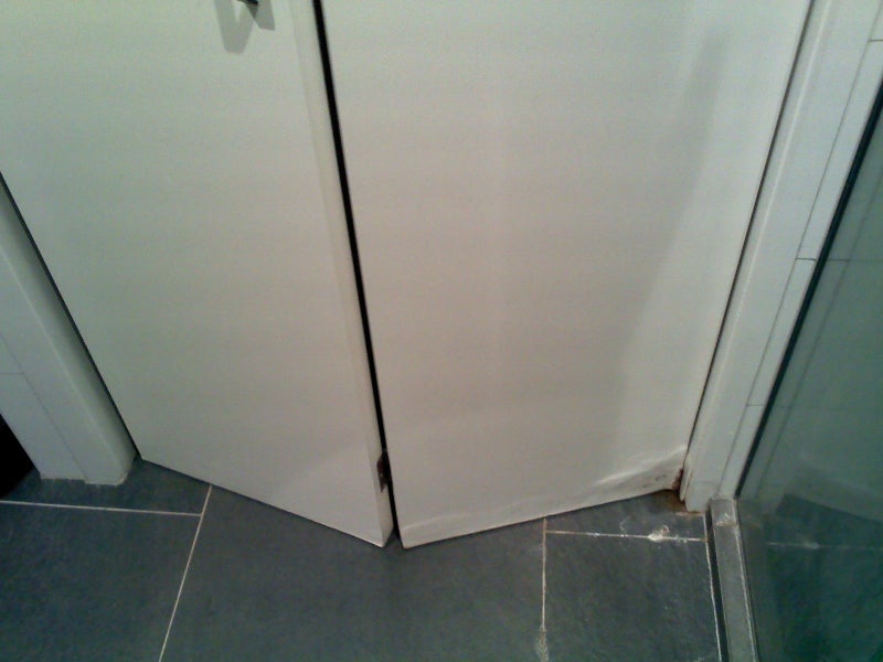 wooden folding door with water damage Carousel 1