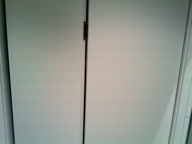 wooden folding door with water damage Carousel 2