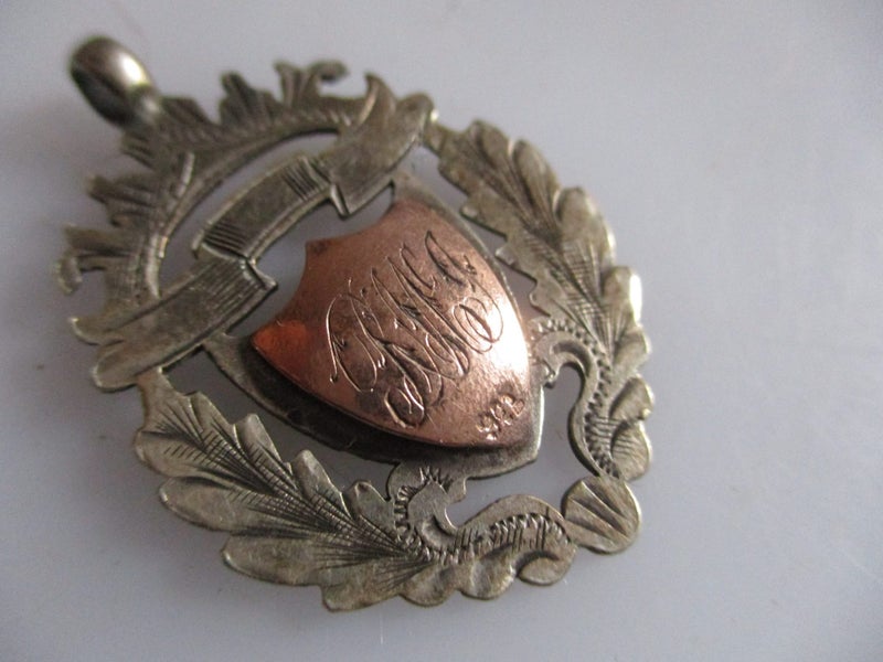 1924 sterling silver with 9ct gold on mid front medal or pendant Carousel 2
