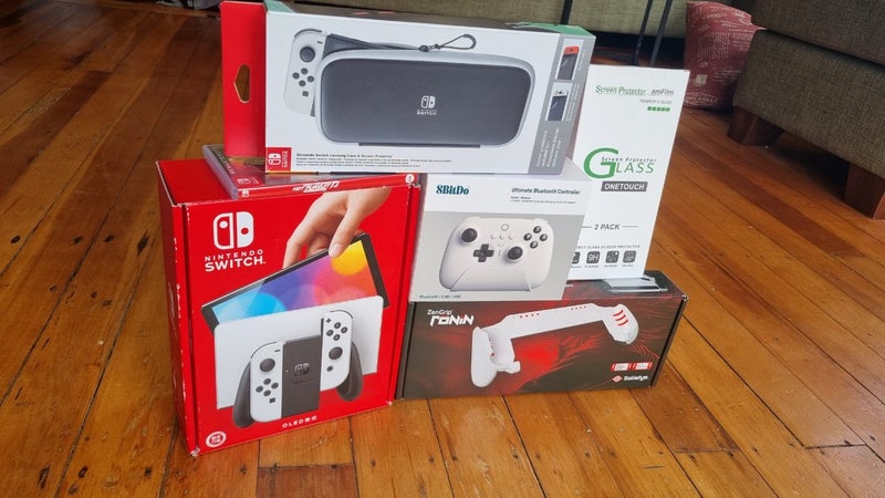 Nintendo Switch OLED Bundle (as new) Carousel 1