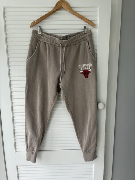 Chicago Bulls track pants, size L. Carousel 1
