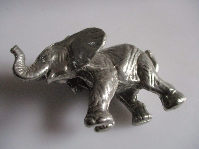 very heavy metal elephant - paper weight ? Carousel 2