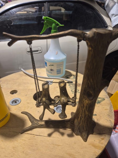 copper art two forms on a swing $1!!! Carousel 1