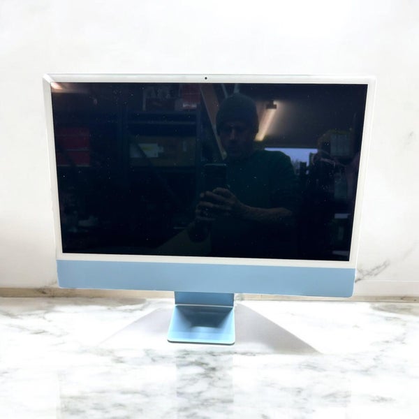Blue 24-inch iMac with Apple M1 chip. Carousel 2