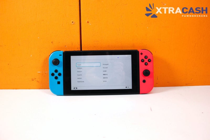 Nintendo Switch Console with Case and Nintendo Controller Carousel 2