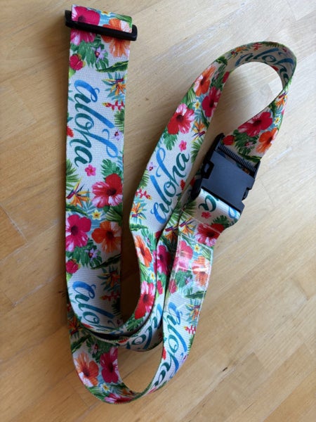 Aloha Suitcase Secure Strap Carousel 1