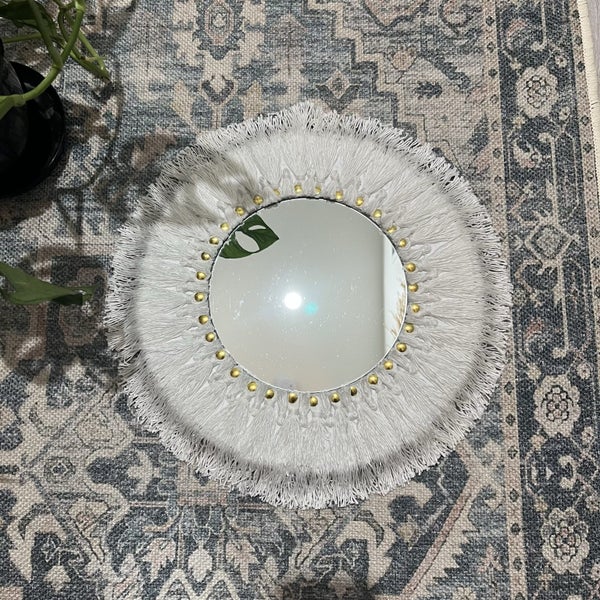 $1Res White Tassel Mirror Carousel 1