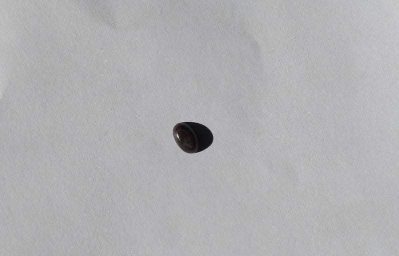Polished Deep Cabochon Corundum with sapphire inclusion Carousel 2