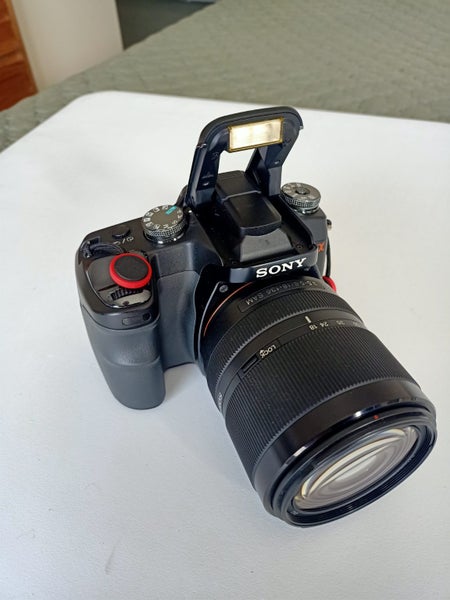Sony Alpha 100 CCD Camera Kit with 4 lenses, accessories, tripod, and case63003959066242111