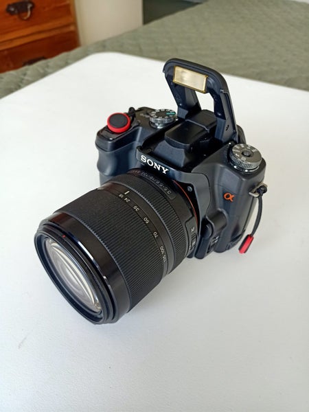 Sony Alpha 100 CCD Camera Kit with 4 lenses, accessories, tripod, and case63003959066242112