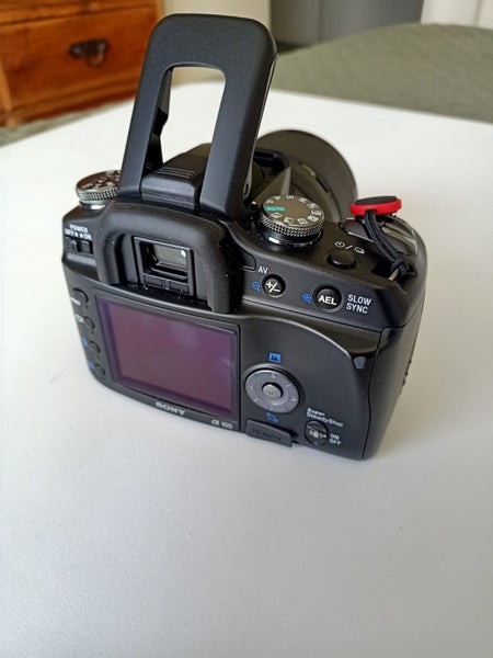 Sony Alpha 100 CCD Camera Kit with 4 lenses, accessories, tripod, and case63003959066242113