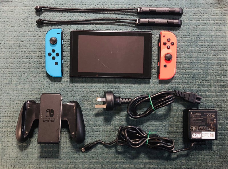 ### $1 Reserve ### Nintendo Switch Switch Consol OEM Blue/Red Joycon Carousel 1