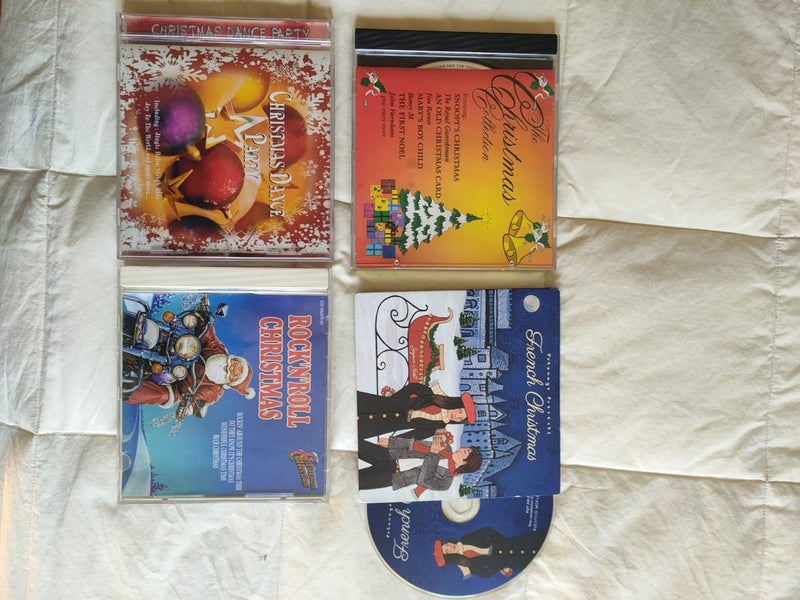 4x bulk, Christmas music CDs. Rock, fun, French Xmas Carousel 4