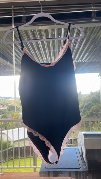 Brand new body suits size large xl and 4xl Carousel 2
