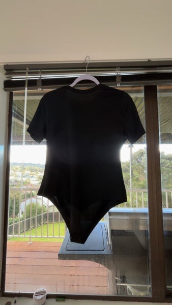 Brand new body suits size large xl and 4xl Carousel 1