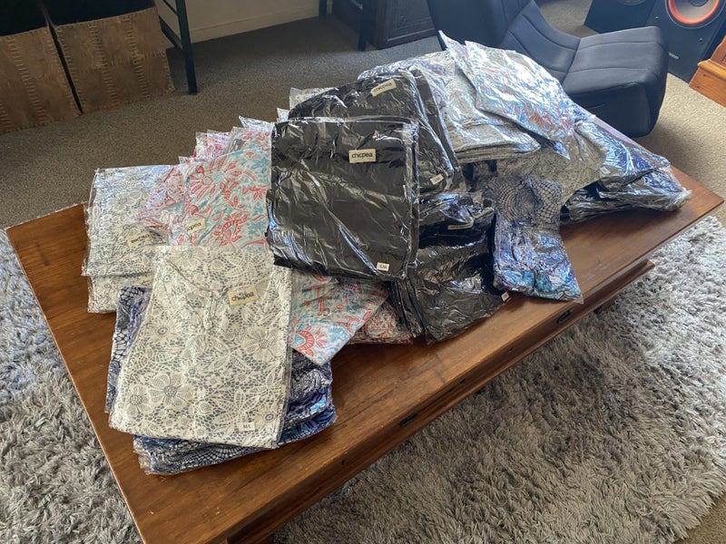 ~$1R - Large wholesale lot of NEW clothing made to order in Bali~ Carousel 1