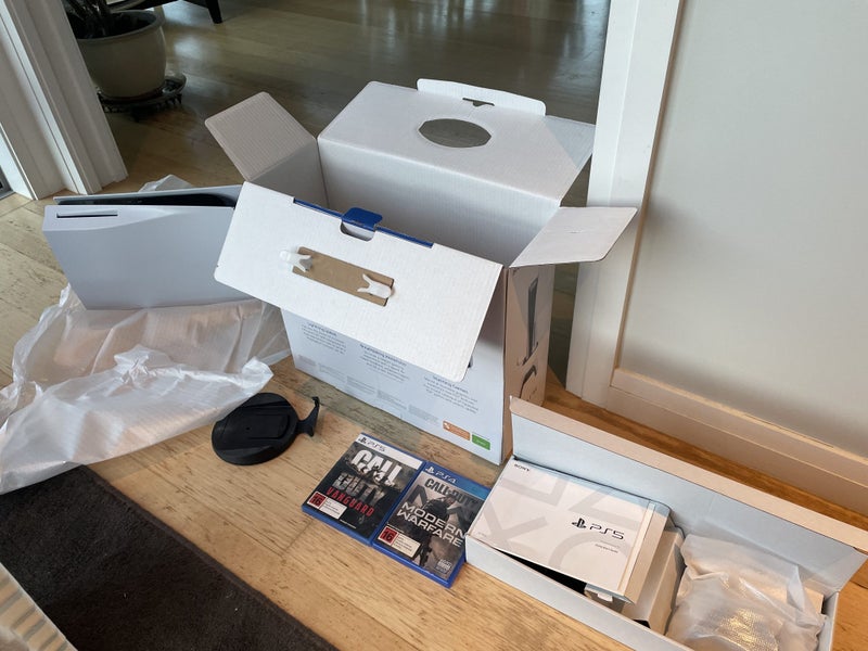 PlayStation 5 brand new console with 2 x COD games Carousel 3