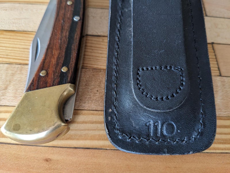 Buck 110 Folding Hunter Knife Carousel 9