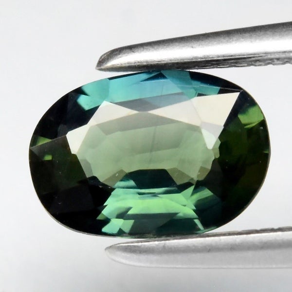$1 RES * Buy Now $1,425.00 * 0.65ct Australia Blue Green Sapphire Loose Gemstone Carousel 1