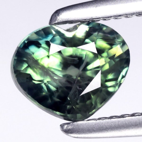 $1 RES * Buy Now $1,300.00 * 0.66ct Heart Blue Green Sapphire Loose Gemstone Carousel 1