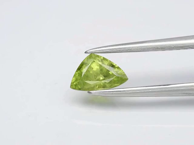 $1 RES * Buy Now $1,300.00 * 0.68ct Trillion Green Sapphire Loose Gemstone Carousel 2