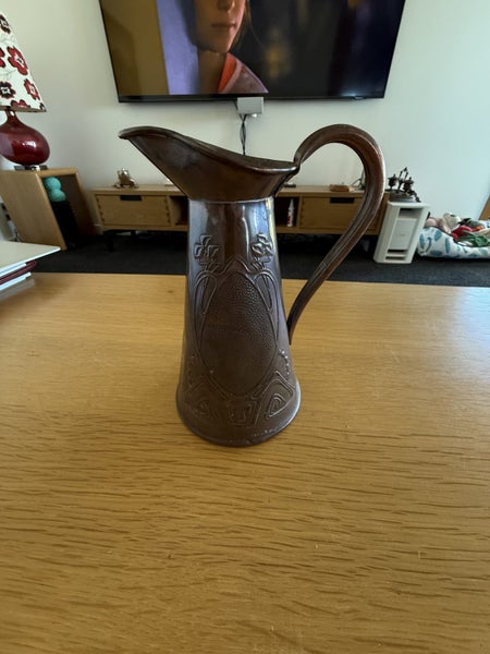 Solid Copper Jug Carousel 1