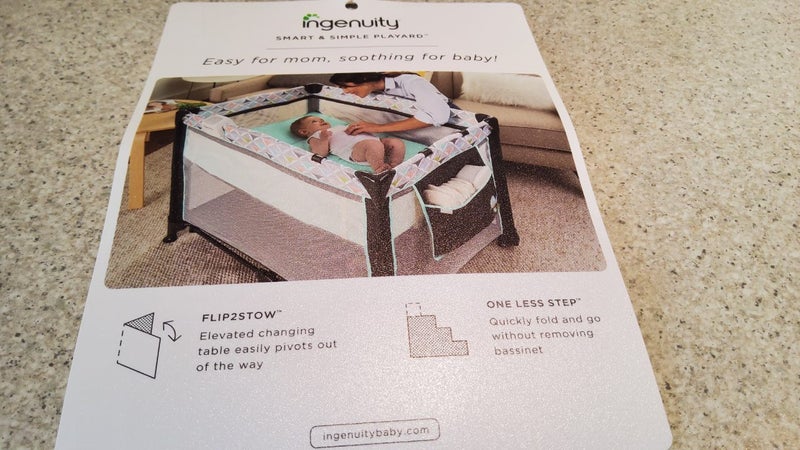 Baby Ingenuity smart and simple travel cot. Carousel 1