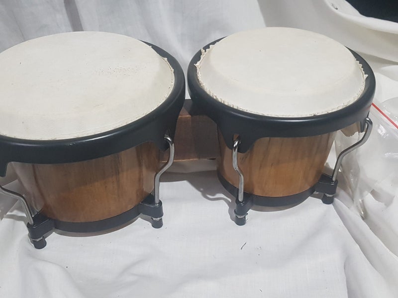 Bongos. 6 & 7 inches diameter. Sound great. new . good quality. Carousel 1
