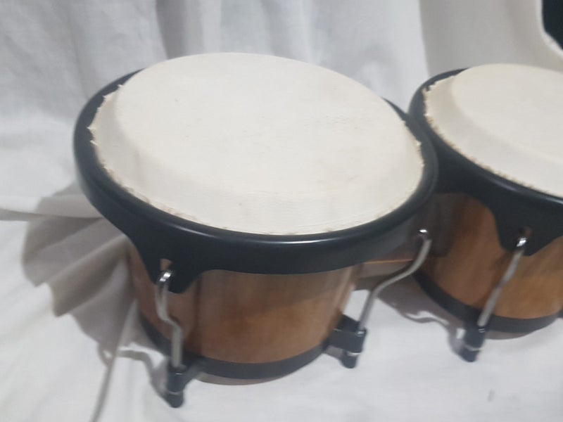 Bongos. 6 & 7 inches diameter. Sound great. new . good quality. Carousel 6