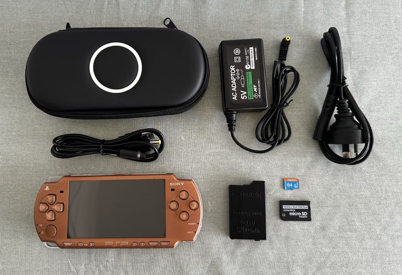 PlayStation Portable (PSP) 2000 – Metallic Copper | 64GB | Fully Set Up Carousel 1