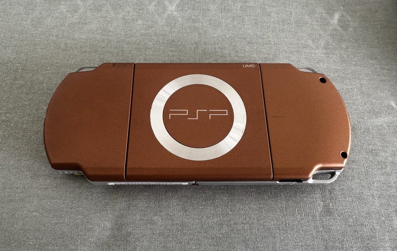 PlayStation Portable (PSP) 2000 – Metallic Copper | 64GB | Fully Set Up Carousel 3